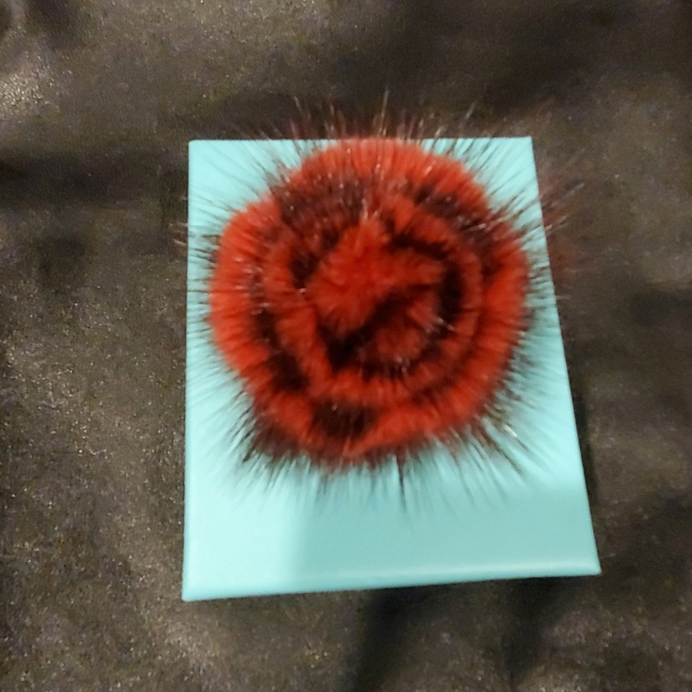 Genuine red dyed fur lapel pin